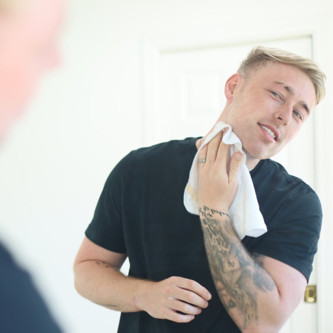 1.	Man using 4-step men’s skincare system at home — simple daily routine