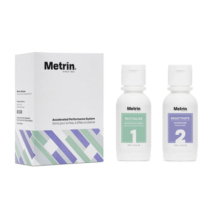 Metrin Accelerated Performance System kit with Revitalize glycolic serum and Reactivate treatment serum beside product box.
